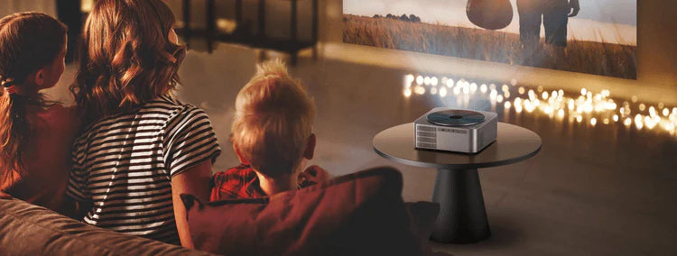 A family watching a movie with the Apollo P40 projector